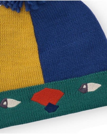Hat for boy in blue, mustard and green color blocks with pom-pom