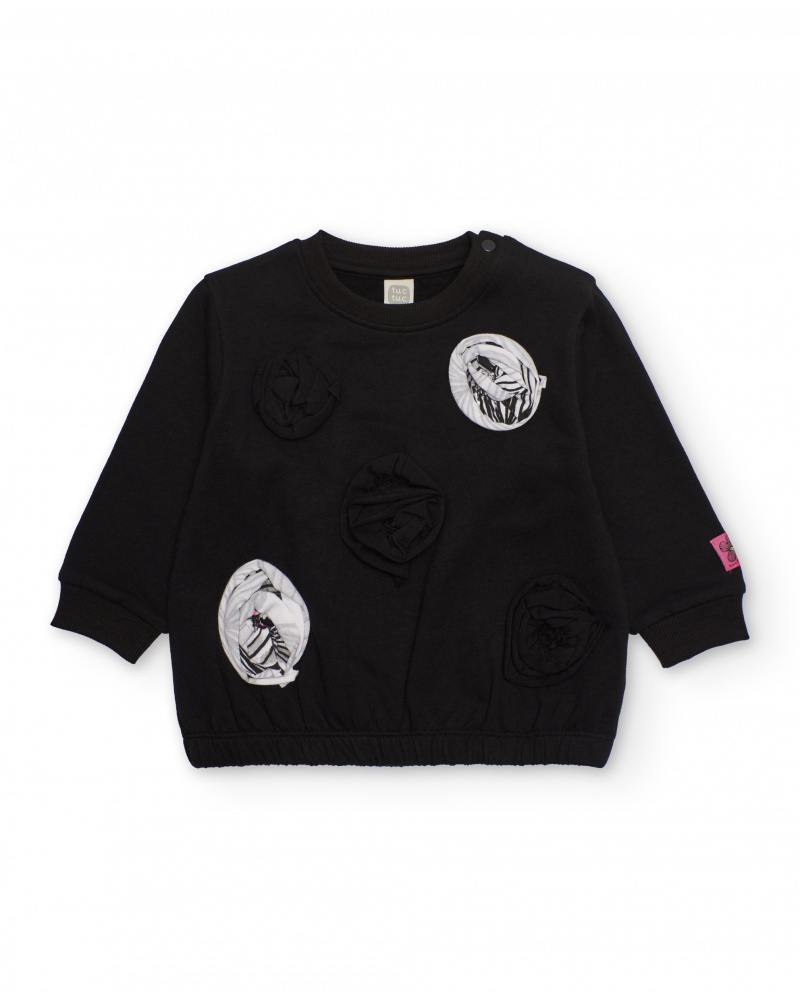 Girl's black sweatshirt with raised circular appliqués