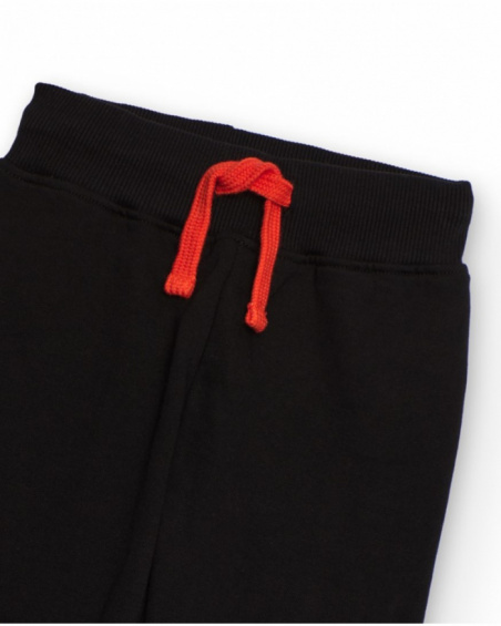 Black fleece pants with red drawstring for boys.