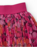 Girl’s skirt with pleated fuchsia tulle and floral print. Girl’s skirt with pleated fuchsia tulle and floral print.