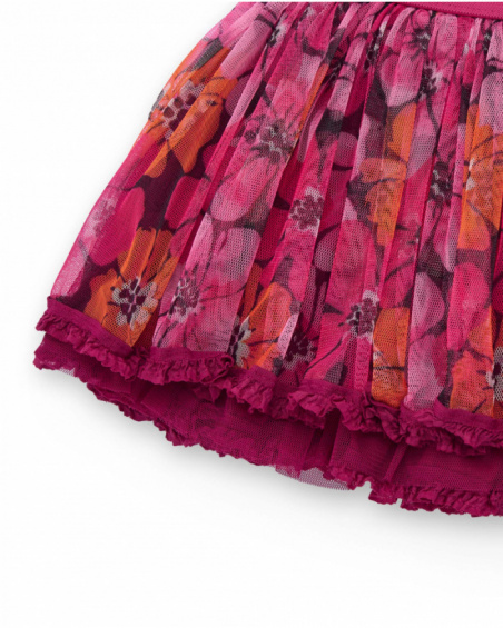Girl’s skirt with pleated fuchsia tulle and floral print. Girl’s skirt with pleated fuchsia tulle and floral print.