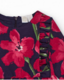 Girl’s dress with red floral print on blue background Girl’s dress with red floral print on blue background