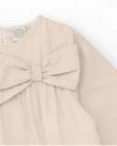 Girls' beige dress with decorative bow Girls' beige dress with decorative bow
