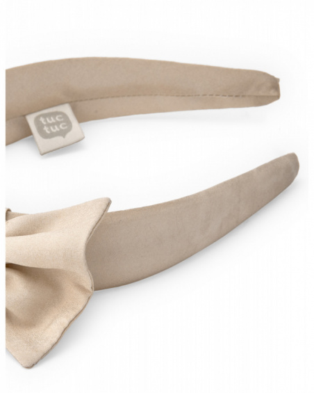 Beige girl’s headband with large decorative bow