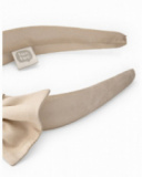 Beige girl’s headband with large decorative bow Beige girl’s headband with large decorative bow