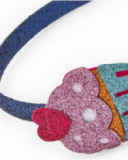 Girls’ blue headband with glitter cupcake appliqué Girls’ blue headband with glitter cupcake appliqué