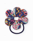 Flower-shaped hair tie for girls with blue-toned print. Flower-shaped hair tie for girls with blue-toned print.
