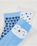 Set of three socks for newborn in blue and white tones with fun prints.