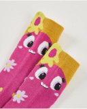 Girls' sock set with floral monster prints and vibrant color details. Girls' sock set with floral monster prints and vibrant color details.