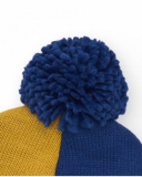 Hat for boy in blue, mustard and green color blocks with pom-pom Hat for boy in blue, mustard and green color blocks with pom-pom