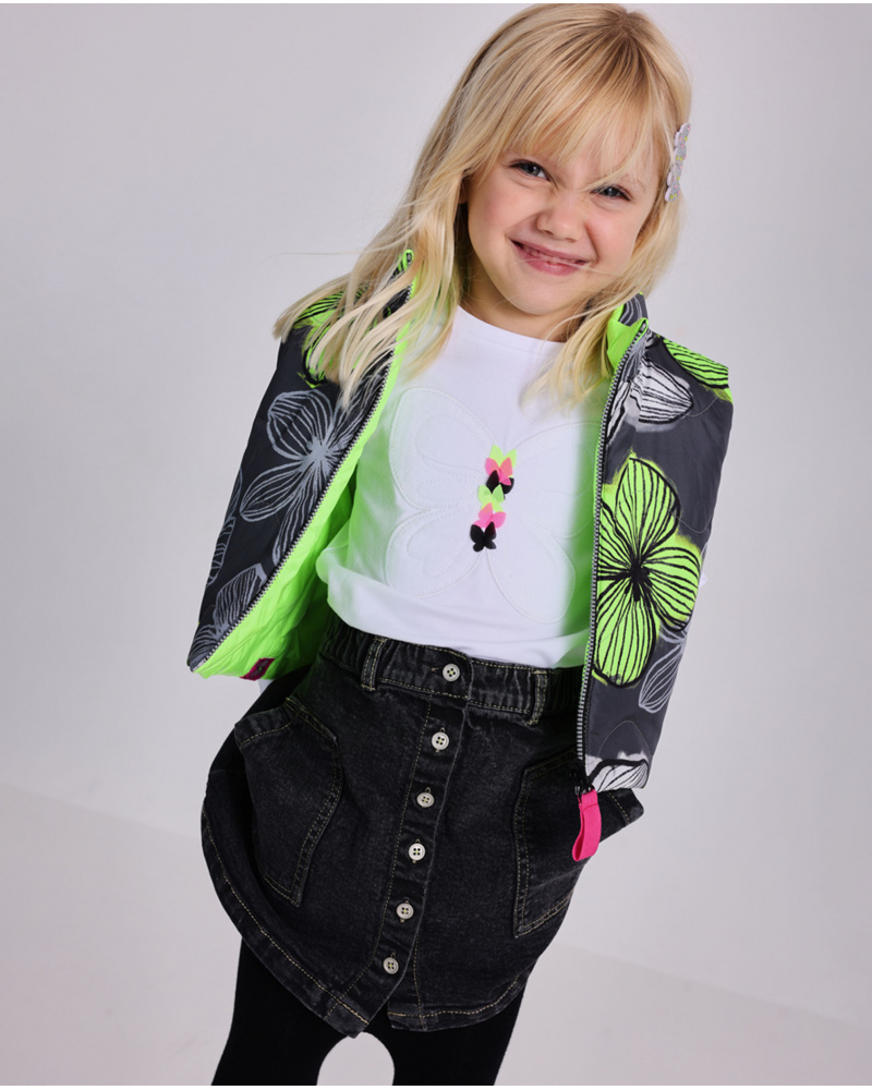 Reversible gilet for girl in neon green with floral print love flowers collection