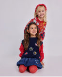 Girls' denim skirt with colorful flower and heart prints. Girls' denim skirt with colorful flower and heart prints.