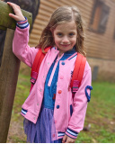 Pink varsity-style jacket for girls with embroidered details and 3D appliqués. Pink varsity-style jacket for girls with embroidered details and 3D appliqués.
