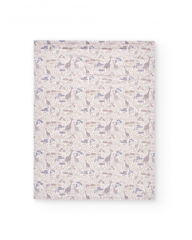 Baby blanket with giraffe print in neutral tones