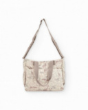 Baby changing bag with giraffe print in neutral tones