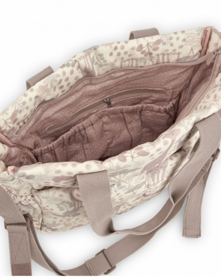 Baby changing bag with giraffe print in neutral tones