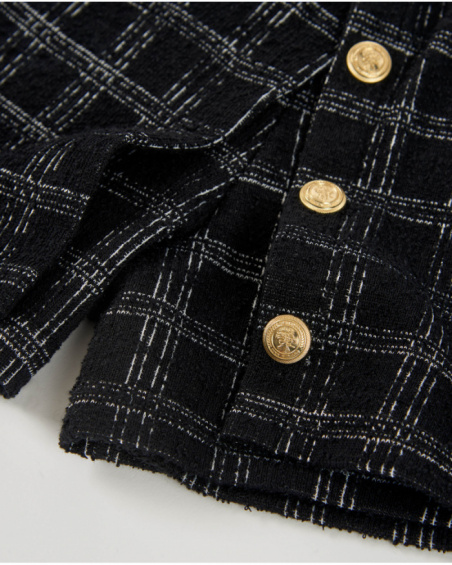 Girls’ black tweed shorts with checks and gold buttons Girls’ black tweed shorts with checks and gold buttons