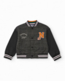 Boys’ varsity jacket with checkered body and black sleeves Boys’ varsity jacket with checkered body and black sleeves
