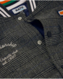 Boys’ varsity jacket with checkered body and black sleeves Boys’ varsity jacket with checkered body and black sleeves