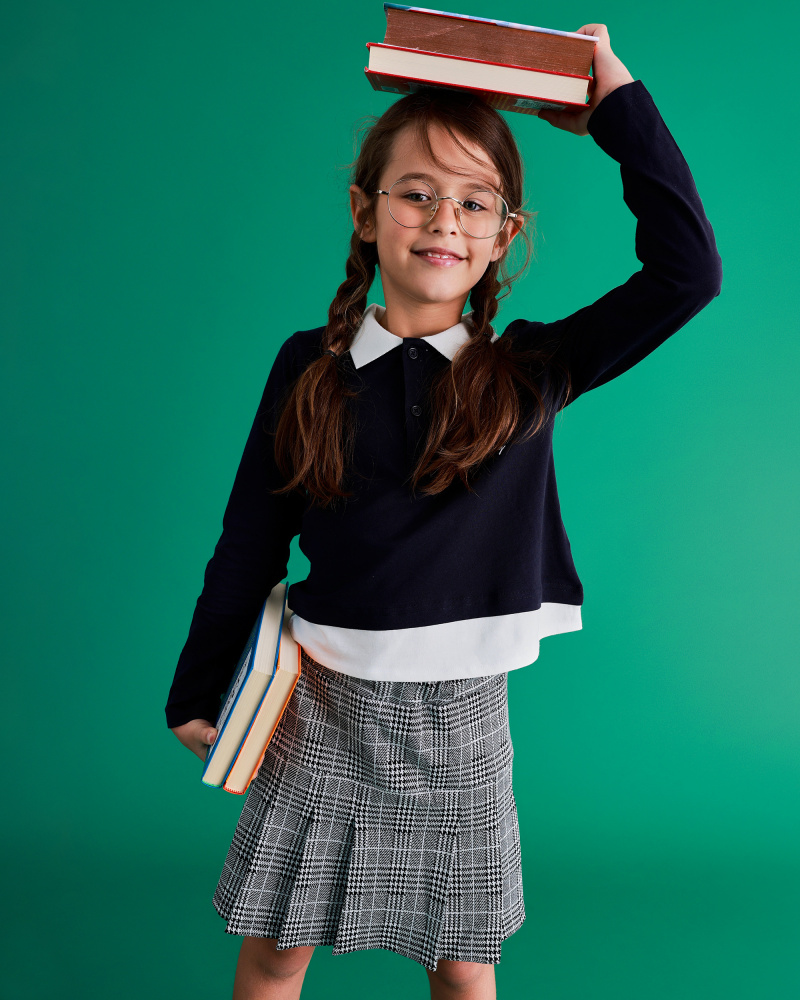 Girl’s checked skirt with pleated design