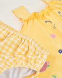 Knitted newborn swimsuit with raised appliqués