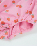 Knitted newborn dungarees with little strawberry print