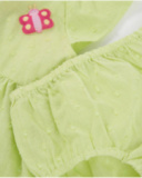 Newborn woven dress with textured polka dots