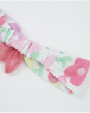 Knitted newborn headband with decorative knot