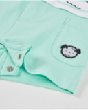 Knitted newborn romper with embroidered detail