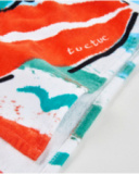 Boys’ knitted poncho towel with raised appliqués