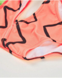 Girls’ knitted swimsuit with asymmetrical ruffle