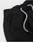 Boys’ woven bermuda shorts with palm tree graphic