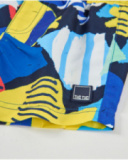 Boys swim shorts in plain weave fabric with an abstract style