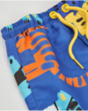 Boys’ swim shorts in woven fabric with tiger print