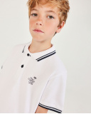 Boys’ knit polo with contrast piping | tuc tuc