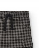 Pantalón felpa niño en negro con estampado de cuadros colección Pantalón felpa niño en negro con estampado de cuadros colección