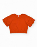 Camiseta naranja para niña con flor y mangas abullonadas Camiseta naranja para niña con flor y mangas abullonadas