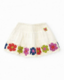 Falda blanca para niña con detalles en crochet multicolor Falda blanca para niña con detalles en crochet multicolor