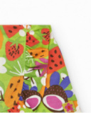 Pantalón corto verde para niña con estampado frutal y volantes Pantalón corto verde para niña con estampado frutal y volantes