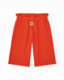 Pantalón culotte naranja para niña con cintura fruncida y lazo Pantalón culotte naranja para niña con cintura fruncida y lazo