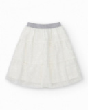 Falda para niña en blanco con lentejuelas y cintura elástica Falda para niña en blanco con lentejuelas y cintura elástica