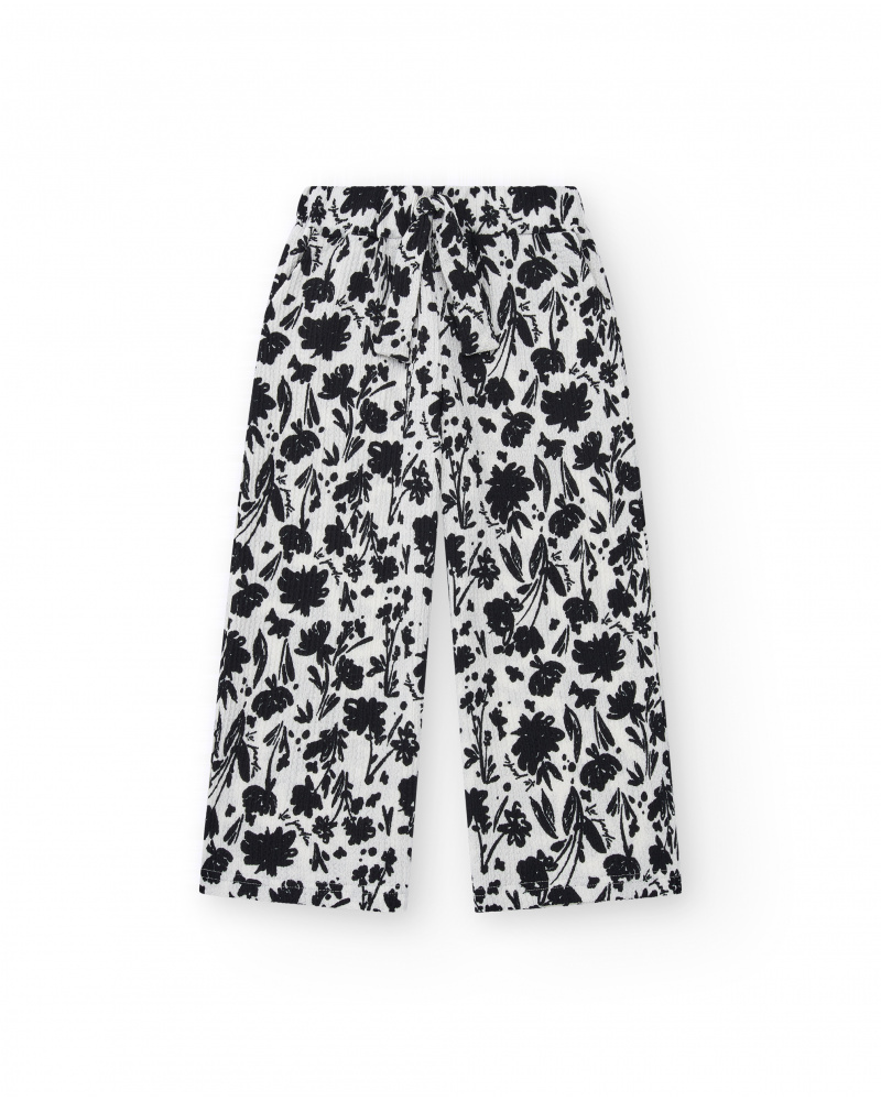 Pantalón para niña en blanco con cintura elástica y estampado