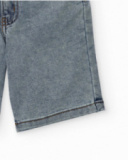 Bermuda niño en denim con bolsillo lateral Bermuda niño en denim con bolsillo lateral