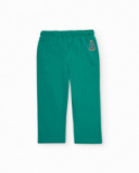 Pantalón de punto para niño color verde con bordado de cohete.