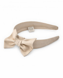 Diadema de niña en beige con gran lazo decorativo