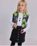 Falda niña en denim negro con bolsillos de parche y botones Falda niña en denim negro con bolsillos de parche y botones