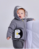 Chaqueta acolchada para recién nacido en gris con capucha con diseño de pingüino | tuc tuc CN