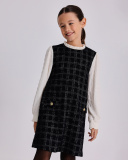 Vestido de niña en tejido de cuadros con mangas en contraste