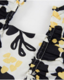 Vestido de niña de plana y tirantes con volantes