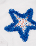 Camiseta de niña de punto y estrella con textura